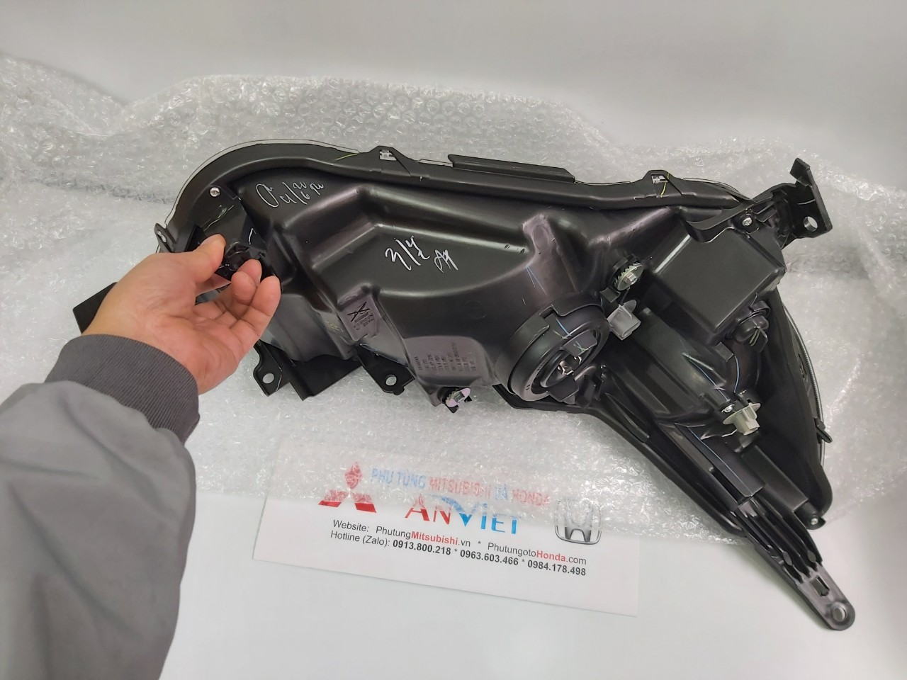 Đèn pha bên lái xe Honda Brio